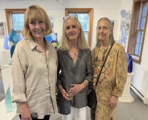 Kathleen Knight, and gallery guests at the opening of “Outside of Time” at the Gallery at Four India Street